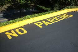 No Parking signage in parking lot by Superior Line Striping